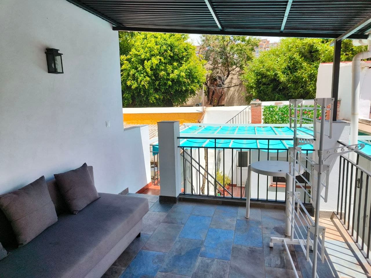 Terraza cubierta · Covered terrace